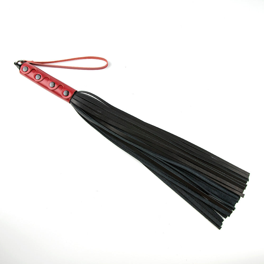 Flogger with leather handle